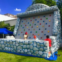 An inflatable rock climbing wall for the more adventurous guests. I ensure all equipment is safe and supervised, so everyone can challenge themselves and have fun.