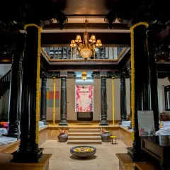 The stage is set for a day of words and warmth. The central courtyard of the heritage home, decorated with marigolds, waiting to be filled with poetry and community spirit.