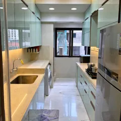 A full-length view of the parallel kitchen in Ghatkopar, showing the seamless flow and ample walking space.