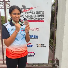 Ipsa Mehta proudly displaying her bronze medal from the U15 National Boxing Championship. Her success shows the strength and potential of our youth and girls' boxing program.