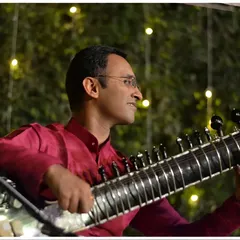 A side profile from the same evening concert, focused on my playing.