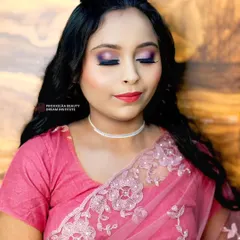 Glam, giggles, and glitter. This party makeup look with a shimmery pink eyeshadow and bold liner is perfect for a night out with friends.