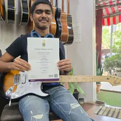 We're celebrating our star student, Jose Fernandes, who is currently preparing for his Grade 3 Rock & Pop Guitar exam. He aced his Grade 2 Theory of Music exam with an amazing score of 97%, showing his deep commitment to all aspects of musicianship.