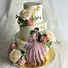 This three-tier masterpiece was for a beautiful Valima ceremony. The couple wanted their outfits and love story reflected in the design, so I handcrafted this edible illustration of them, surrounded by delicate sugar flowers matching the bride's sari. It’s these personal touches that turn a cake into a cherished part of the celebration.