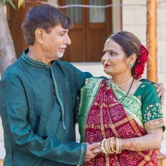 A heartwarming photo of my parents. Her makeup looks natural and sophisticated, enhancing her features without appearing heavy, which is key for mature skin.