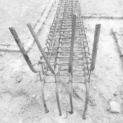 A close-up of the rebar framework for a structural column. This is the essential skeleton that provides strength and form to the concrete structure.
