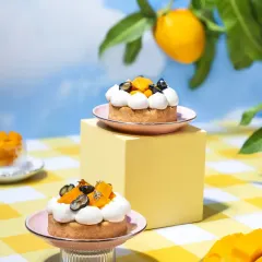 We created this whimsical summer picnic to celebrate the magic of mango season. This shot is from a concept we designed from the ground up, using a surreal outdoor setting with bright, airy tones and minimal props to let the beautiful mango desserts be the hero.