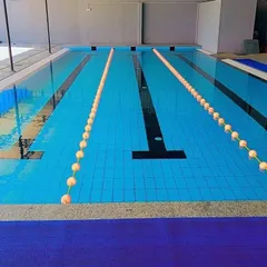 A look at our pristine, multi-lane swimming pool where all our aquatic fitness classes take place. The clear water and organized lanes reflect our commitment to providing a professional and hygienic environment for your workout.