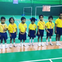 Lined up and ready to learn. A group of children in our beginner's batch listens to instructions before starting their drills for the day.