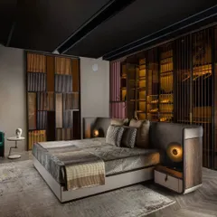 This is our ISOLA bedroom concept, which reimagines the room's flow by centering the bed. The wardrobe acts as a backdrop, creating an intimate and sophisticated space defined by neutral tones and a combination of veneer and upholstery.