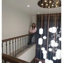 Here I am at a recently completed law office project in Defence Colony. The double-height space with the cascading pendant light fixture was a highlight of this sophisticated commercial design.
