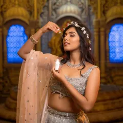 This is a commercial lifestyle shot for the beauty brand Apsaras Beauty. The focus is on creating an ethereal mood that highlights the product, making it perfect for social media campaigns and online stores.