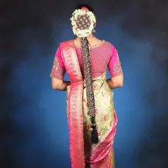 This traditional South Indian bridal braid is a work of art. We learn how to create this beautiful hairstyle, complete with flowers and traditional "jadai" accessories, in my pro course.