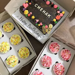 A sweet birthday bundle for a little girl named Chehak. This order included a floral sheet cake and two boxes of matching cupcakes in yellow and pink.