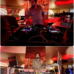 A full view of my DJ setup during a party. I use professional Pioneer DJ equipment and a VDJ setup to ensure the best sound and visual quality for your event.