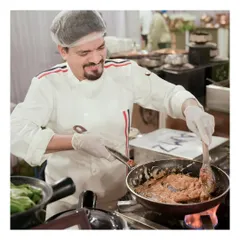 A chef's smile says it all. We take pride in our craft, and our team enjoys interacting with guests while preparing their favorite dishes at our live counters.