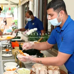 Our team in action, serving guests with a smile. Their dedication to attentive hospitality is what makes every celebration we cater a truly special one.
