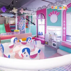 The Fun Burrow is designed for imaginative play, with a pretend-play kitchen area and adorable rocking horses, all within a safe, cushioned space.