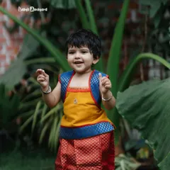 Sweetness overloaded in this vibrant, traditional South Indian outfit.