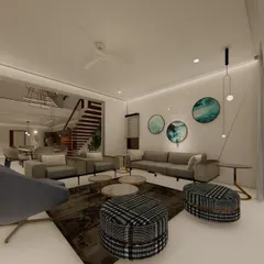 This living room uses a cool, contemporary color palette of greys and blues. The open-plan space flows into the dining area and staircase, creating a sense of spaciousness, while curated art adds a personal touch.