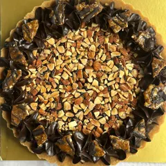 Even acclaimed film director Shoojit Sircar enjoyed my dark chocolate and almond tart! It's a testament to its irresistible combination of flavors and textures.