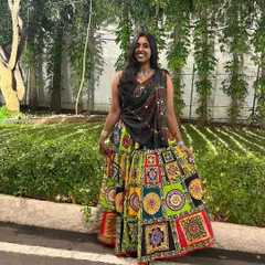 A full look at my colorful outfit for a Dandiya event. I can help you with costume ideas that complement the choreography and make your performance even more vibrant.