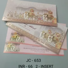 This card features a classic baraat scene with decorated elephants and musicians, embossed for a textured feel. It's a beautiful representation of traditional wedding festivities, available with matching inserts.