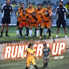 We came, we saw, we conquered. Here is our girls' squad celebrating as runners up at the Goa Cup 2025. This picture shows our team with their coaches and a player in full control during the match, proving we compete at the highest level.