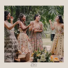 Cheers to the bride tribe! We styled the bridesmaids in coordinating floral Payal Singhal outfits that complemented the bride's look without overshadowing it. The result is a joyful, stylish, and perfectly coordinated celebration.