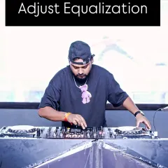 Here I am adjusting the equalization on my mixer. Fine-tuning the bass, mids, and highs is crucial for blending two tracks together perfectly.