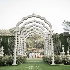 First impressions are everything. I designed this dramatic, all-white architectural walkway to create a sense of awe and anticipation, guiding guests into a celebration that was both grand and elegant.
