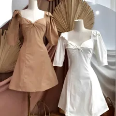 These made-to-measure A-line dresses are a favorite among my clients. The design features trendy puff sleeves and a sweetheart neckline, creating a look that is both sweet and stylish. I can customize the length and fabric for any occasion.