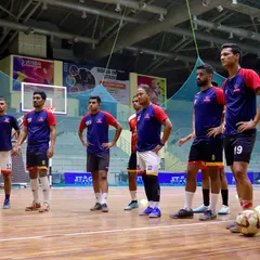 The Goal Hunterz FC futsal team stands ready for training. Our spacious indoor court allows for full team drills and strategic preparation for major championships.
