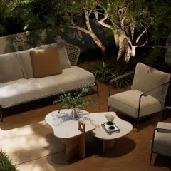This render shows the outdoor deck connected to the den, designed as a tranquil escape with comfortable lounge furniture and soft landscape lighting.