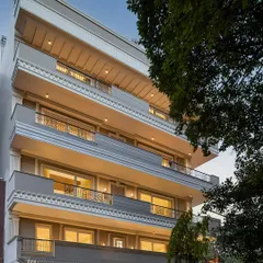 The facade of the KAIRA residence in South Delhi, a project defined by its carefully curated neo-classical elements. We used intricate mouldings and motifs to create a distinguished presence on a busy urban street.