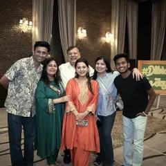 A picture with the happy family during rehearsals. We become a part of the family during the process, ensuring everyone is comfortable and confident.