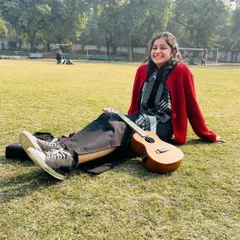 Chilling in the park with my ukulele on a sunny winter day. These are the moments of peace and joy that fuel my music.