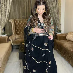 The complete look is effortlessly beautiful. The soft waves in her hair and the natural makeup are perfect for a day of wedding celebrations.