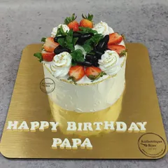 A simple and delicious vanilla chocolate fruit cake. Topped with fresh strawberries and grapes, it's a lighter option for those who love the taste of fresh fruit.