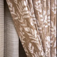 A close-up of our luxurious velvet blend drape, showcasing the delicate, nature-inspired leaf motifs in contrasting ivory thread. This detail highlights the graceful play of pattern and texture.