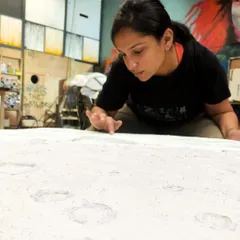 Here I am, completely absorbed in creating the textured surface of my moon sculpture. This work-in-progress shot captures the focus and hands-on detail that goes into every piece. I'm clearly over the moon!