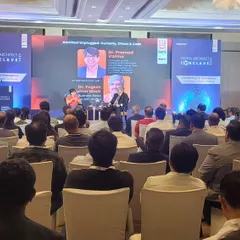 A live panel discussion in progress at the Digital Architect Conclave. This shot shows a fully engaged audience and our seamless on-stage production, including the main LED screen and side panels for branding.