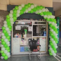 My balloon arch services are suitable for any type of business. This is a simple green and white arch I created for the opening of a local medical store, providing a fresh and inviting look.