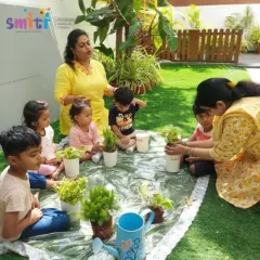 Teachers and children gather for a gardening session. On World Environment Day, we reaffirm our commitment to nurturing hearts that protect our planet.