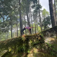 Drawing awareness away from the external world with a full Wheel Pose in nature. This deep backbend, or Urdhva Dhanurasana, is a powerful heart opener that strengthens your entire body.
