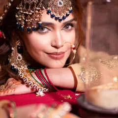 My students learn to create stunning, culturally rich looks inspired by trends like Heeramandi. We dive deep into traditional makeup artistry, mastering the details of everything from eye makeup to jewelry placement for a truly authentic and glamorous result.