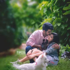 This is the same sweet moment captured from a slightly different angle. The focus remains on the couple's loving embrace, with their loyal pet adding a sense of peace and completeness to the scene.