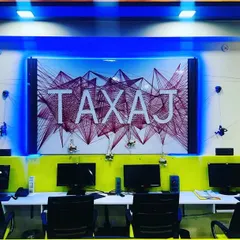 The heart of our office, featuring our custom "TAXAJ" string art. This represents the interconnected nature of financial compliance and how we tie everything together for our clients.