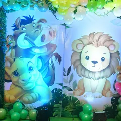 I use custom-printed panels for every event, never reused flex. This close-up shows the high-quality Lion King artwork for a jungle party.