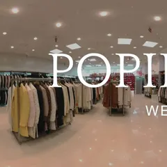 A panoramic view of my spacious and well-lit store. You can see the extensive collection of wedding wear I have for both men and women.